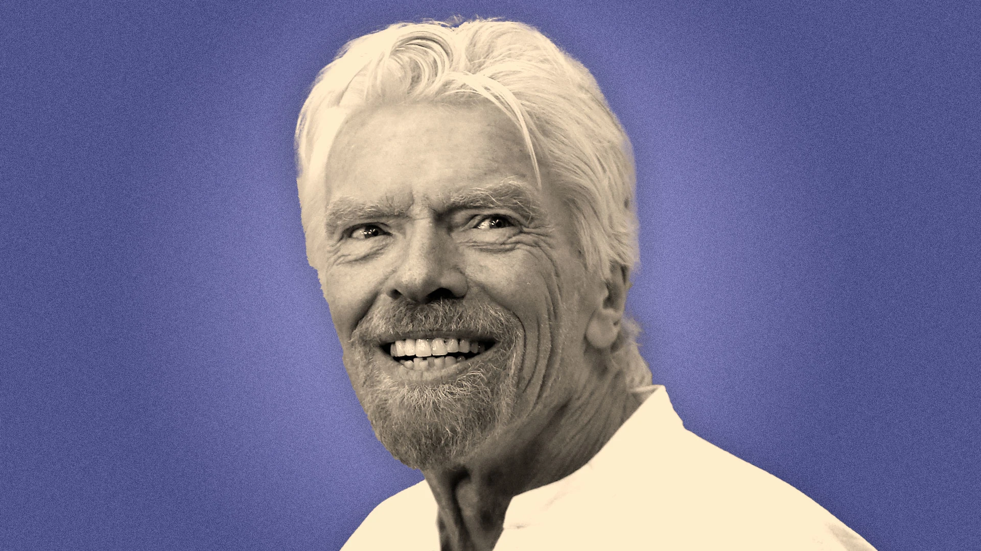 A portrait of an older man with a white beard and hair, smiling against a blue background. He is wearing a white shirt.