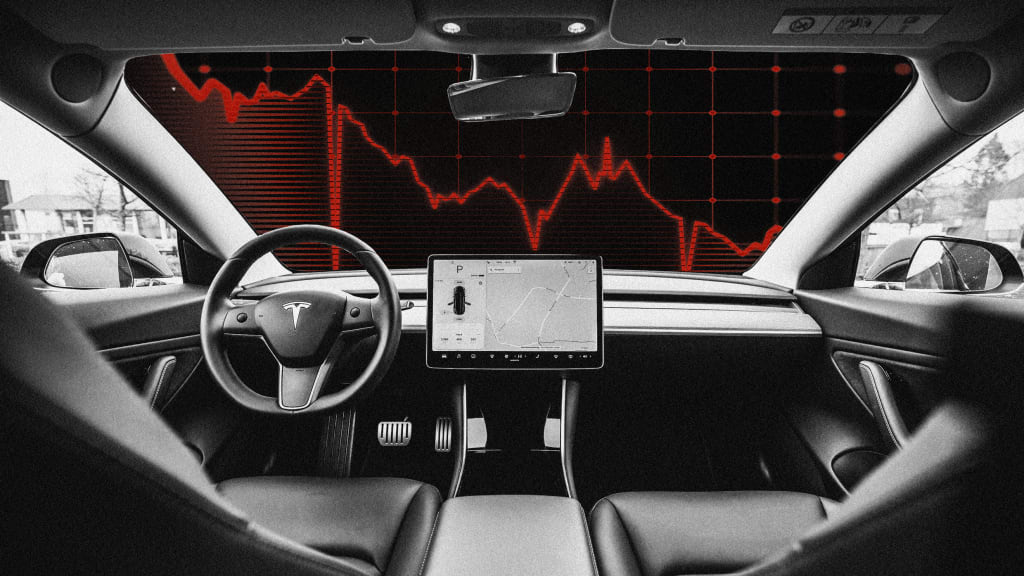 Black-and-white photo of a Tesla car interior, with the dashboard screen showing a map. Outside the windshield, a large red stock market graph with sharp declines is visible, overlaying the view.